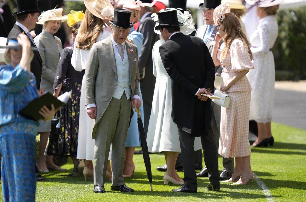 King Charles speaks with Edoardo Mapelli Mozzi and Princess Beatrice during day one of Royal Ascot