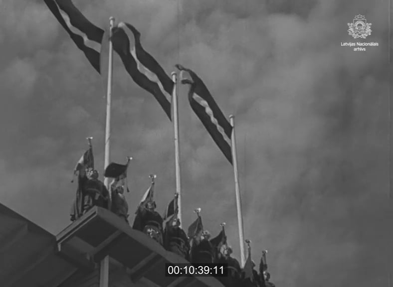 Short excerpts from the 1938 Latvian Song Festival - the grandest to that point. With 100,000 spectators, 16,000 singers, 380 choirs, and a fanfare at the opening, it went down in history as the last Latvian Song Festival held in interwar-era Latvia.