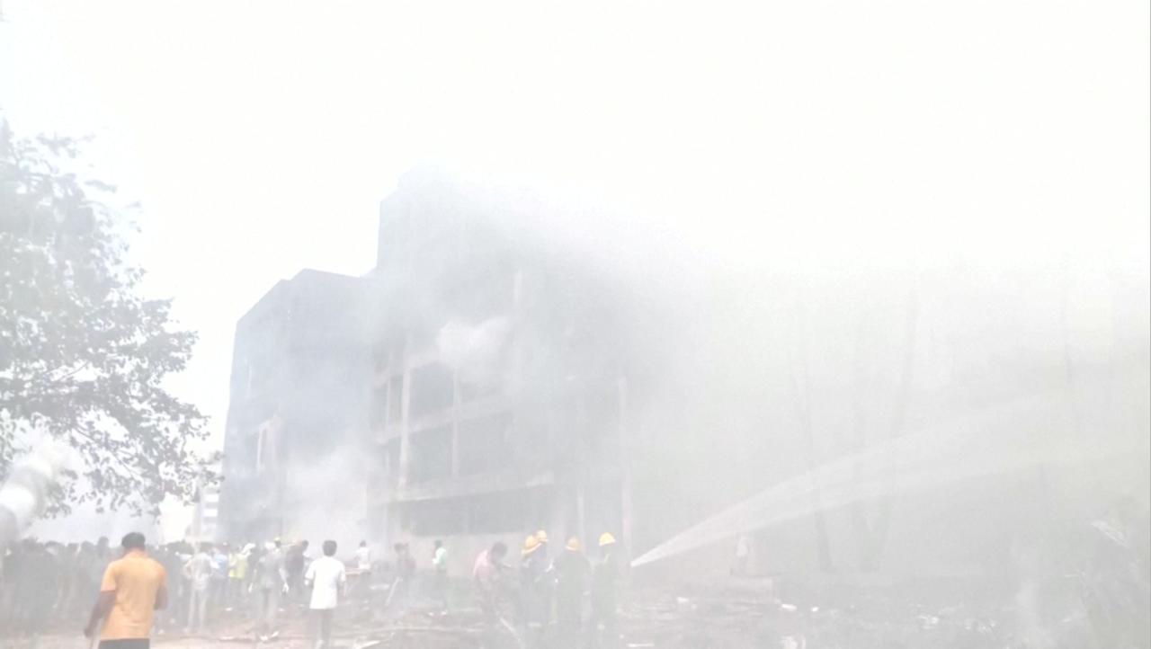 Emergency personnel work around a damaged building where an Air India plane crashed in Ahmedabad, India, June 12, 2025, in this still image taken from video. ANI/Reuters TV via REUTERS    THIS IMAGE HAS BEEN SUPPLIED BY A THIRD PARTY. INDIA OUT. NO COMMERCIAL OR EDITORIAL SALES IN INDIA.