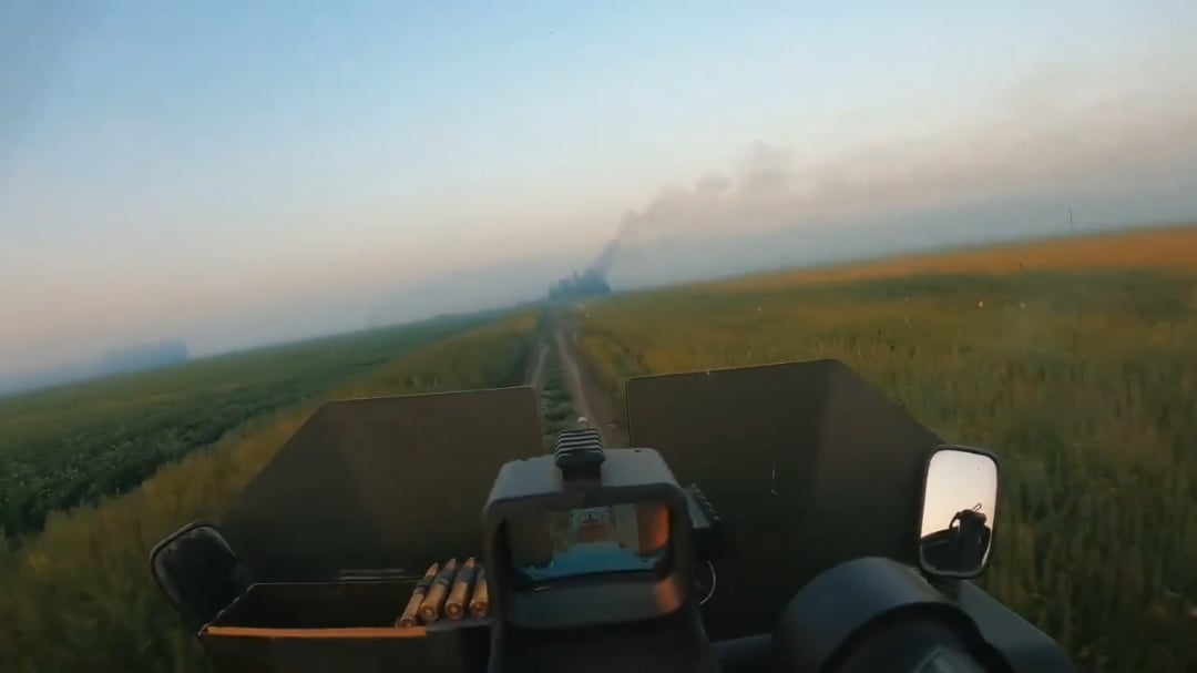 Ukrainian machine gunner of the "North side group" unit suppressing a Russian position with a Browning M2 .50 caliber machine gun. Most likely Kursk/Belgorod border direction. [Published 27.06.2025]
