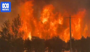 Thousands evacuate wildfires burning across central Canada