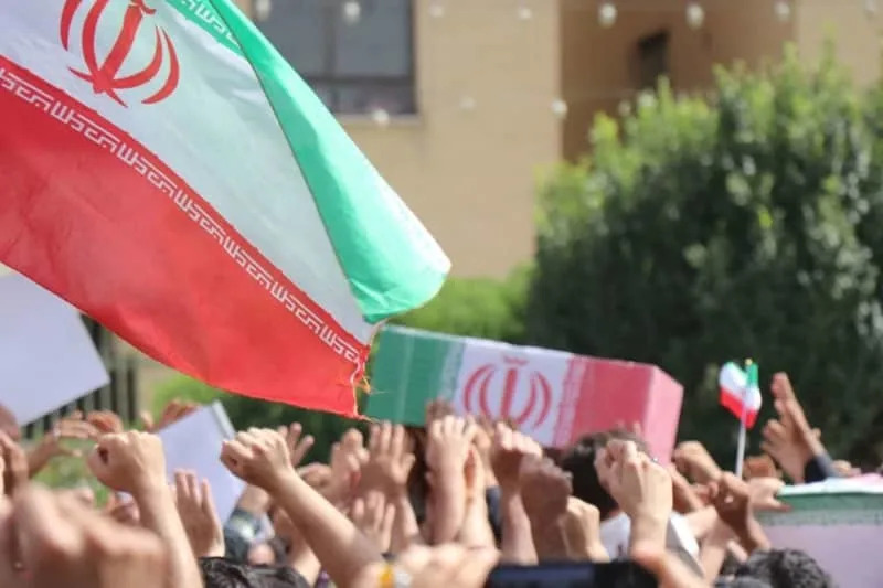 Iranians carry the coffins of Iranian victims, who were killed in Israeli airstrike. Sepahnews/ZUMA Press Wire/dpa