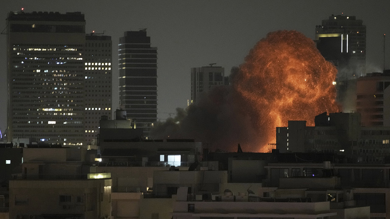 Iran targets major civilian sites in Israel as airstrikes kill at least 24