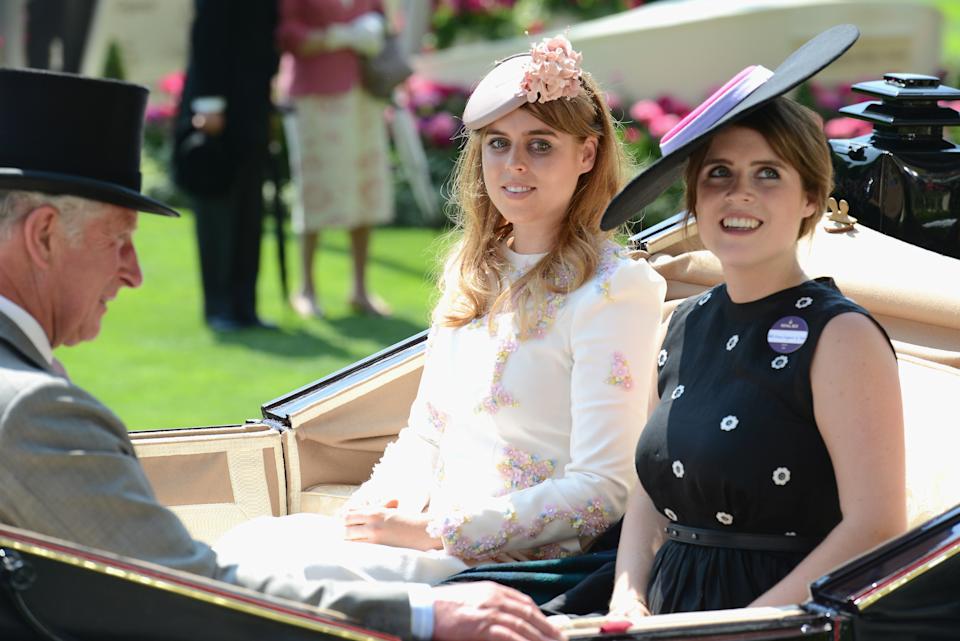 King Charles wears a top hat and travels in a carriage with Princess Beatrice and Princess Eugenie at Ascot in 2017