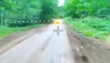 Insane display of skill by both the drone operator and the driver