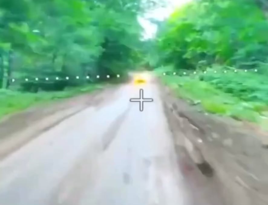 Insane display of skill by both the drone operator and the driver