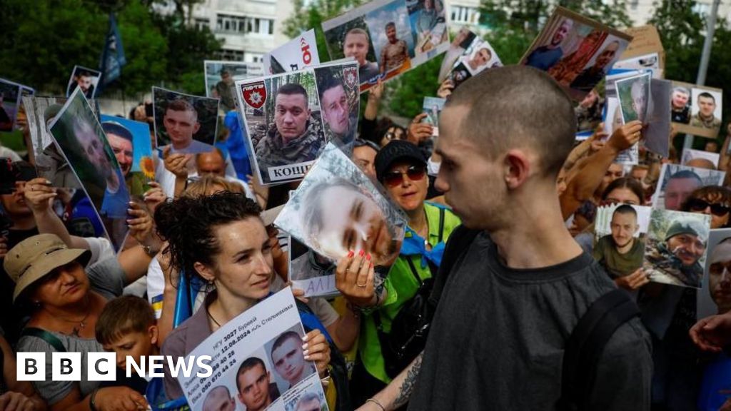Families of missing Ukrainians gather as prisoner exchange begins