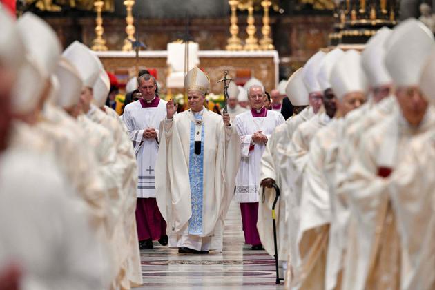 Pope Leo XIV and members of the clergy in Saint Peter's Basilica, at the Vatican, on June 9, 2025.