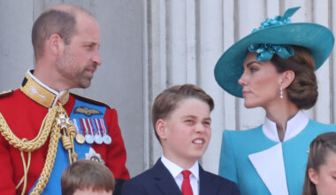 Kate Middleton and Prince William talking on the Buckingham Palace balcony at Trooping the Colour