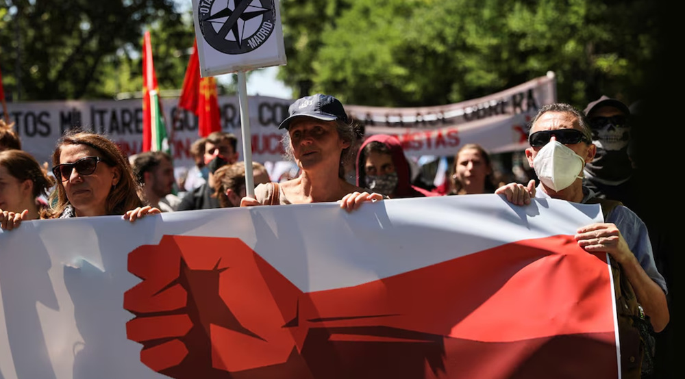 Madrid marches against NATO rearmament plan