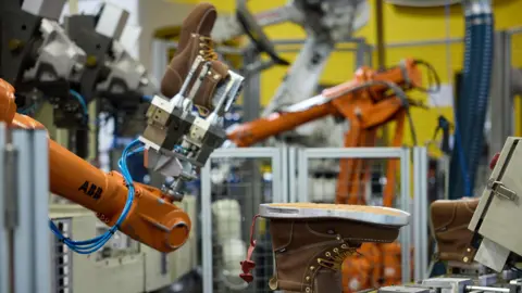 Keen Boots being manufactured by robots at the company's facility in Portland, Oregon