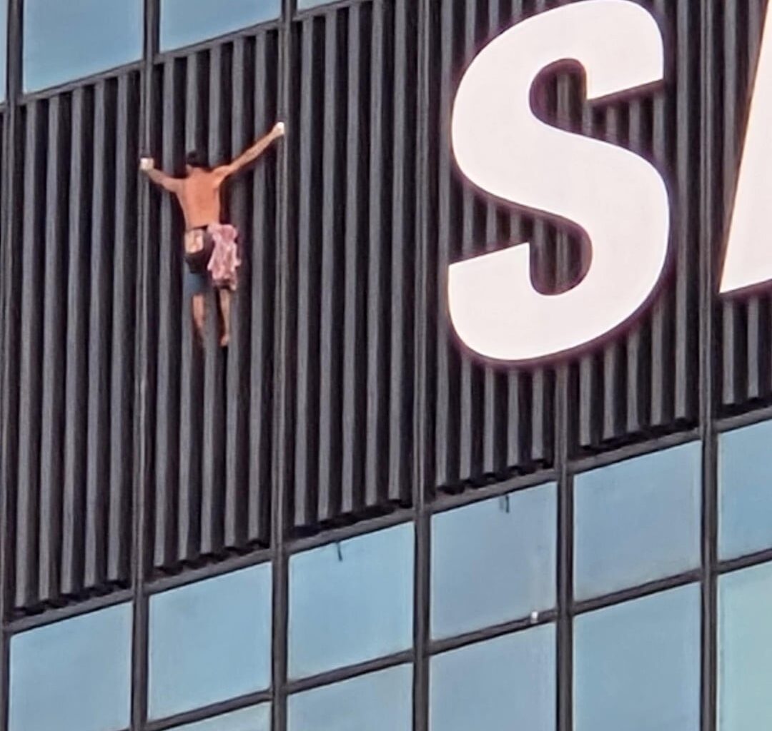 Dude climbing the Samsung skyscraper in Warsaw