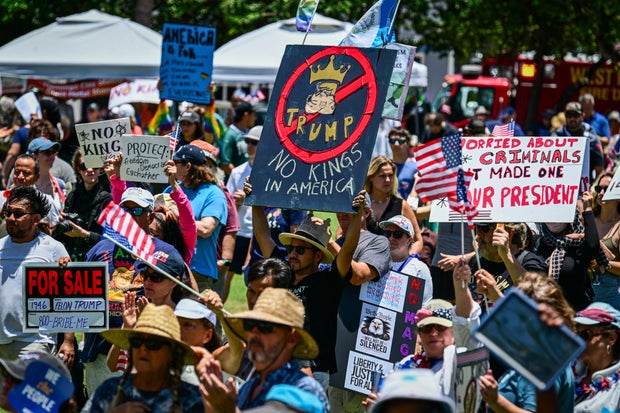 Demonstrators hold a 