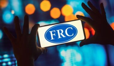 Financial Reporting Council (FRC) logo is displayed on a smartphone.