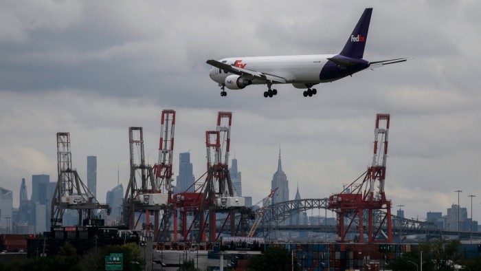 A FedEx plane prepares to land at Newark Airport in Newark, New Jersey