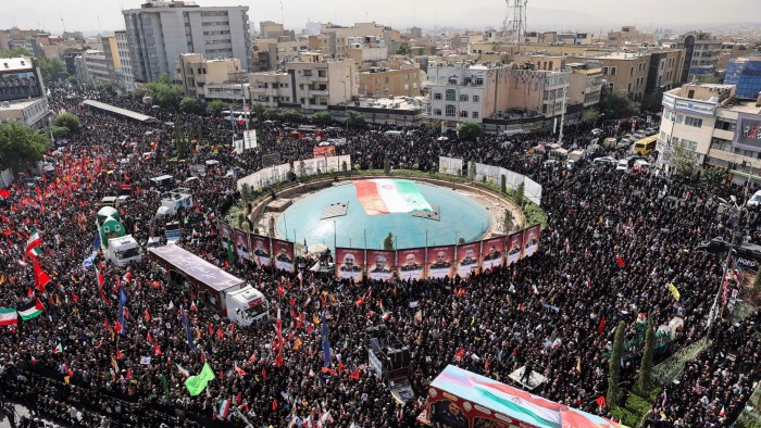 People attend the funeral procession of Iranian military commanders, nuclear scientists and others killed in Israeli strikes