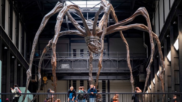 Interior view of the artwork ‘Maman’ by Louise Bourgeois at Tate Modern gallery of contemporary art in London, United Kingdom. This sculpture of a giant mother spider was the first exhibit commission in the Turbine Hall when Tate Modern opened for the first time 25 years ago