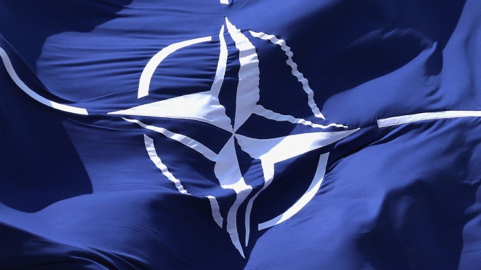 A Nato flag flutters at its headquarters in Brussels, Belgium