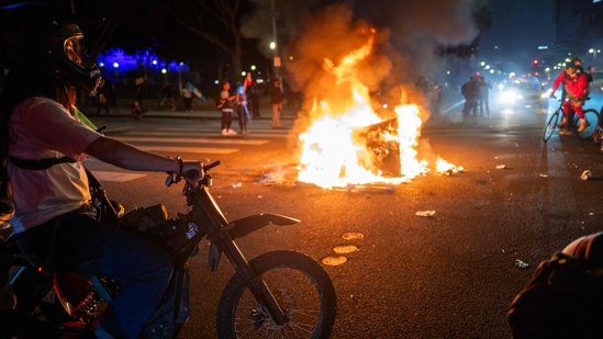 Protests continue into the night following two days of clashes with police after a series of immigration raids on June 08, 2025, in Los Angeles. Protests continue into the night following two days of clashes with police after a series of immigration raids on June 08, 2025, in Los Angeles.