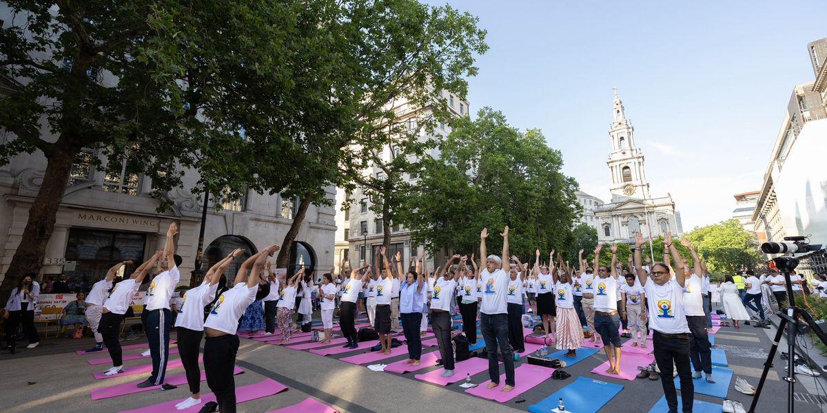 King Charles praises yoga as thousands join global celebrations