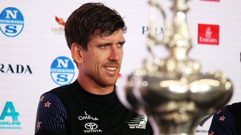 Peter Burling speaks to media after winning the America's Cup in Auckland in 2021.