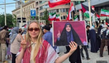 Brave German activist risks nothing to support everything she doesn’t understand. Performative solidarity strikes again