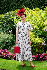 ASCOT, ENGLAND - JUNE 17: A racegoer (wearing a Marta Holod hat) attends the 1st day of Royal Ascot on June 17, 2025 in Ascot, England.  (Photo by Kirstin Sinclair/Getty Images for Royal Ascot 2025)