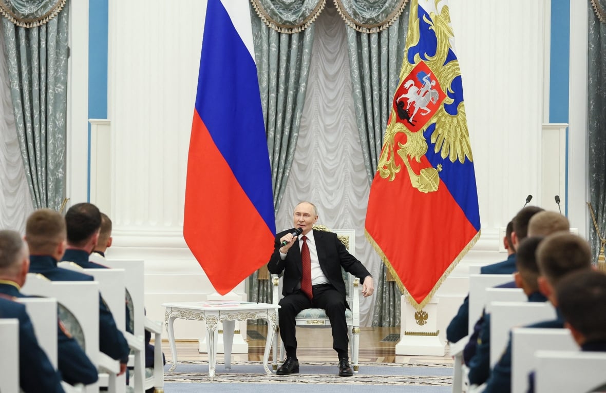 Russia's President Vladimir Putin attends a meeting on June, 12, 2025 with participants of the "Time of Heroes" project established for Russian service members and veterans, who served in Ukraine.