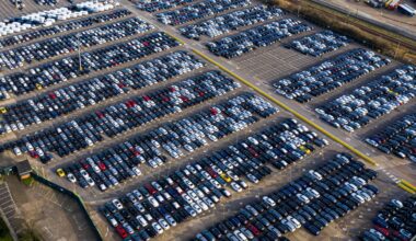 Aerial view car ship, New Cars produced up in the port for ship and import-export united kingdom