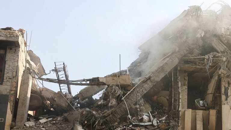 Smoke rises from a damaged building in the aftermath of Israeli strikes, in Tehran, Iran.
Pic: WANA/Reutes