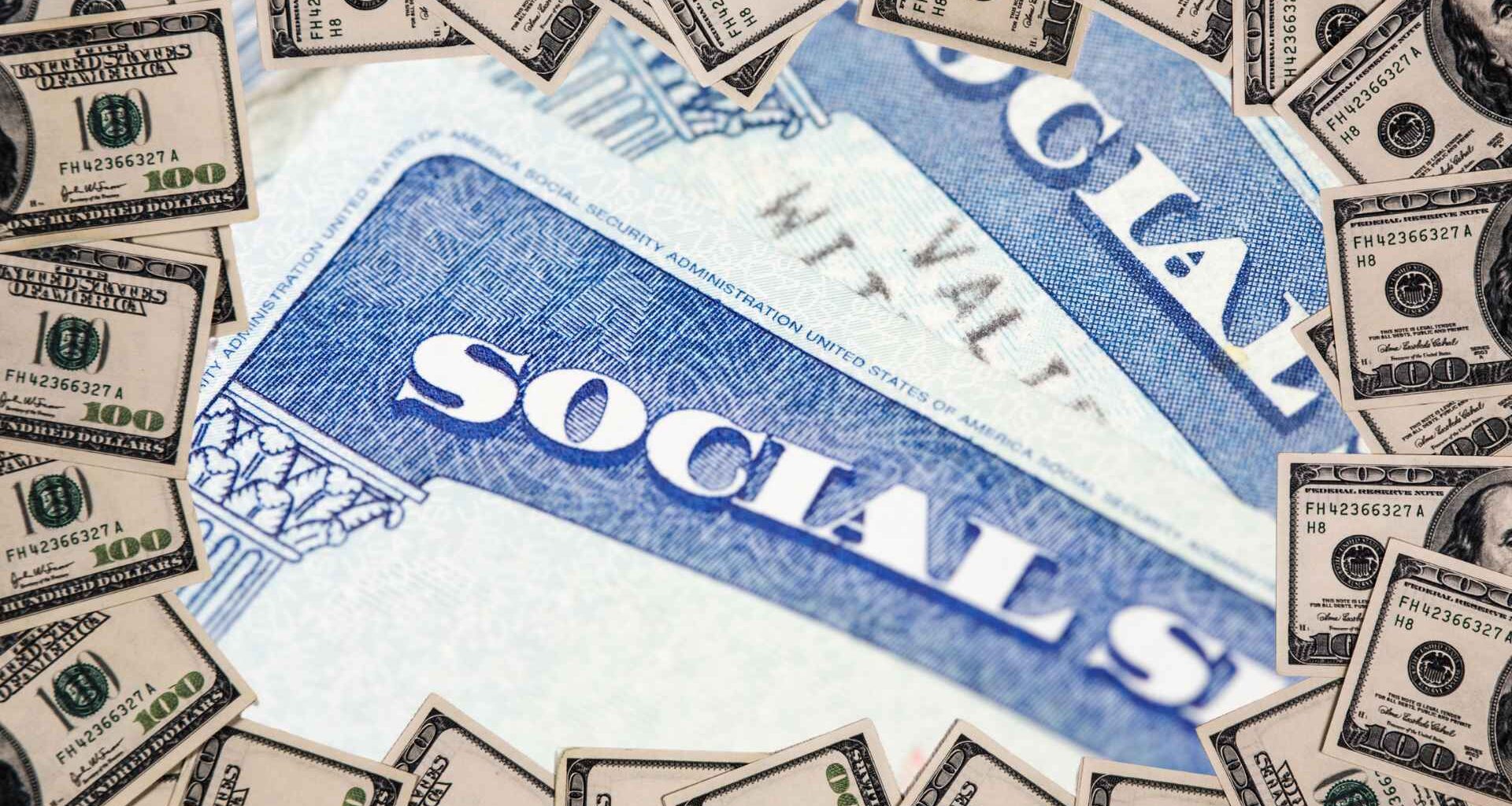 Social Security card encircled by hundred-dollar bills, symbolizing benefit-suspension risk in May 2025