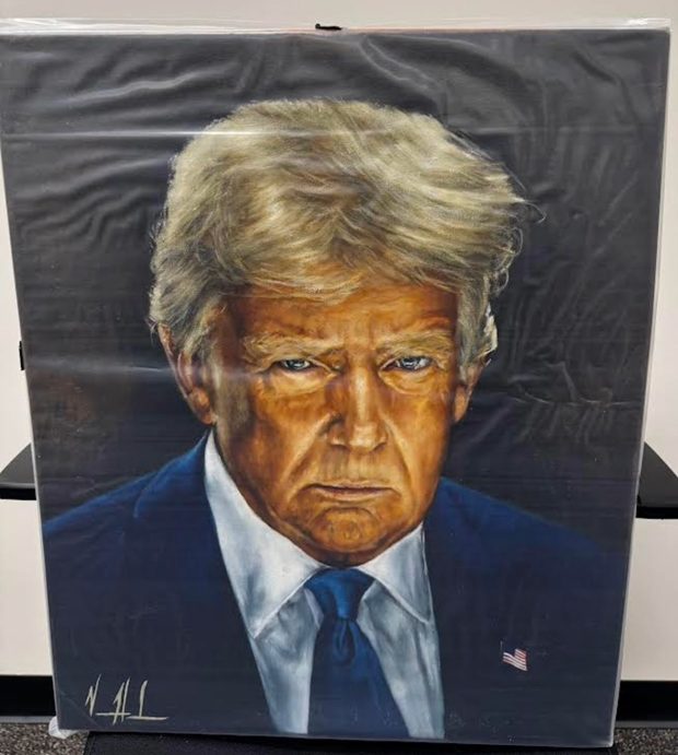 A new portrait of President Donald Trump that was provided by the White House is set to be unveiled soon in the Colorado State Capitol, after it's framed. The portrait was painted by artist Vanessa Horabuena of Tempe, Arizona, and temporarily replaces another portrait of Trump that was removed from a state Capitol wall after the president found it objectionable. (Provided by Colorado Legislative Council Staff)