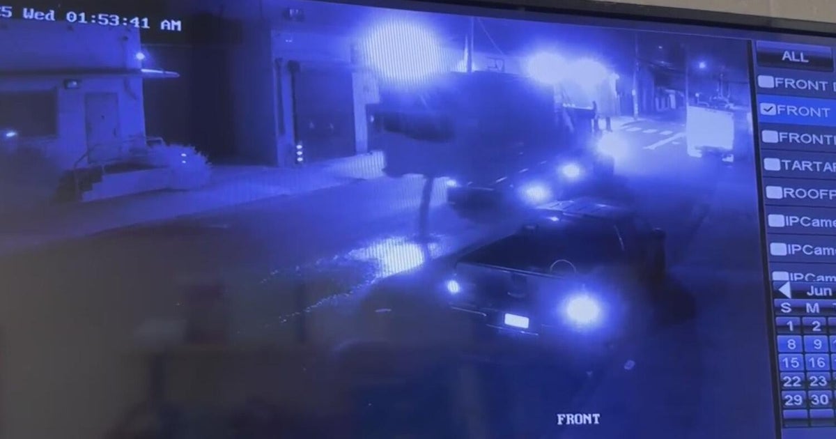 Oakland business's camera records truck dumping unknown substance on street