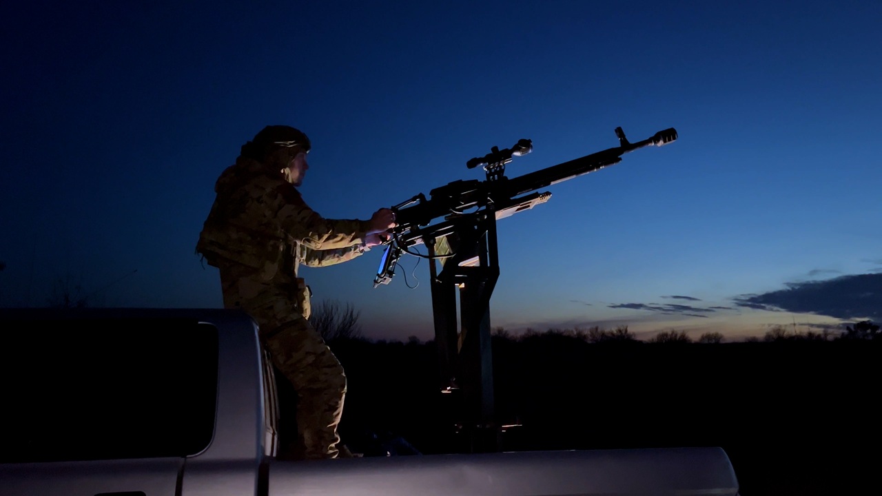 A Ukrainian anti-air gunner at night.