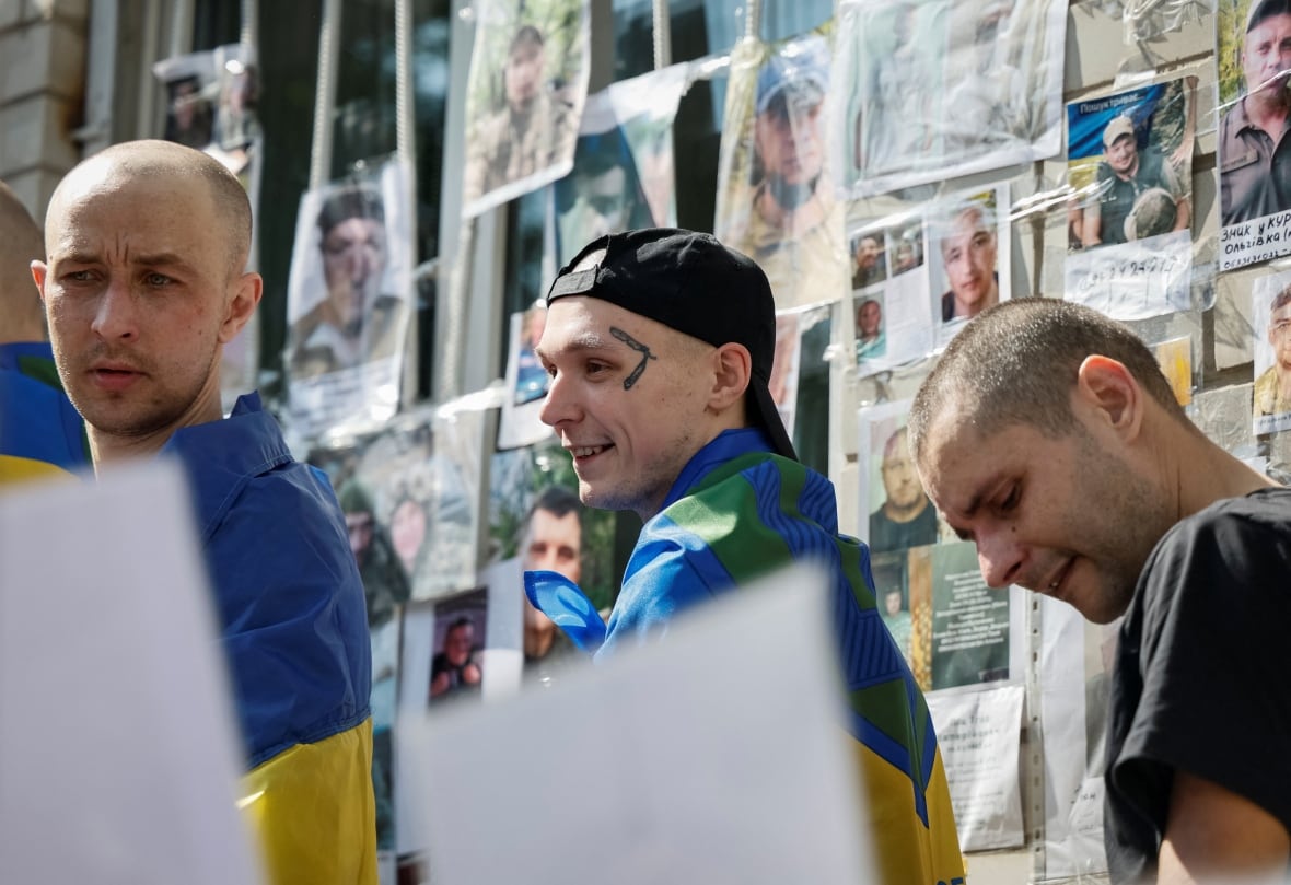 Freed Ukrainian prisoners of war (POWs) return after a swap, amid Russia's attack on Ukraine, in an undisclosed location in Ukraine June 12, 2025. 