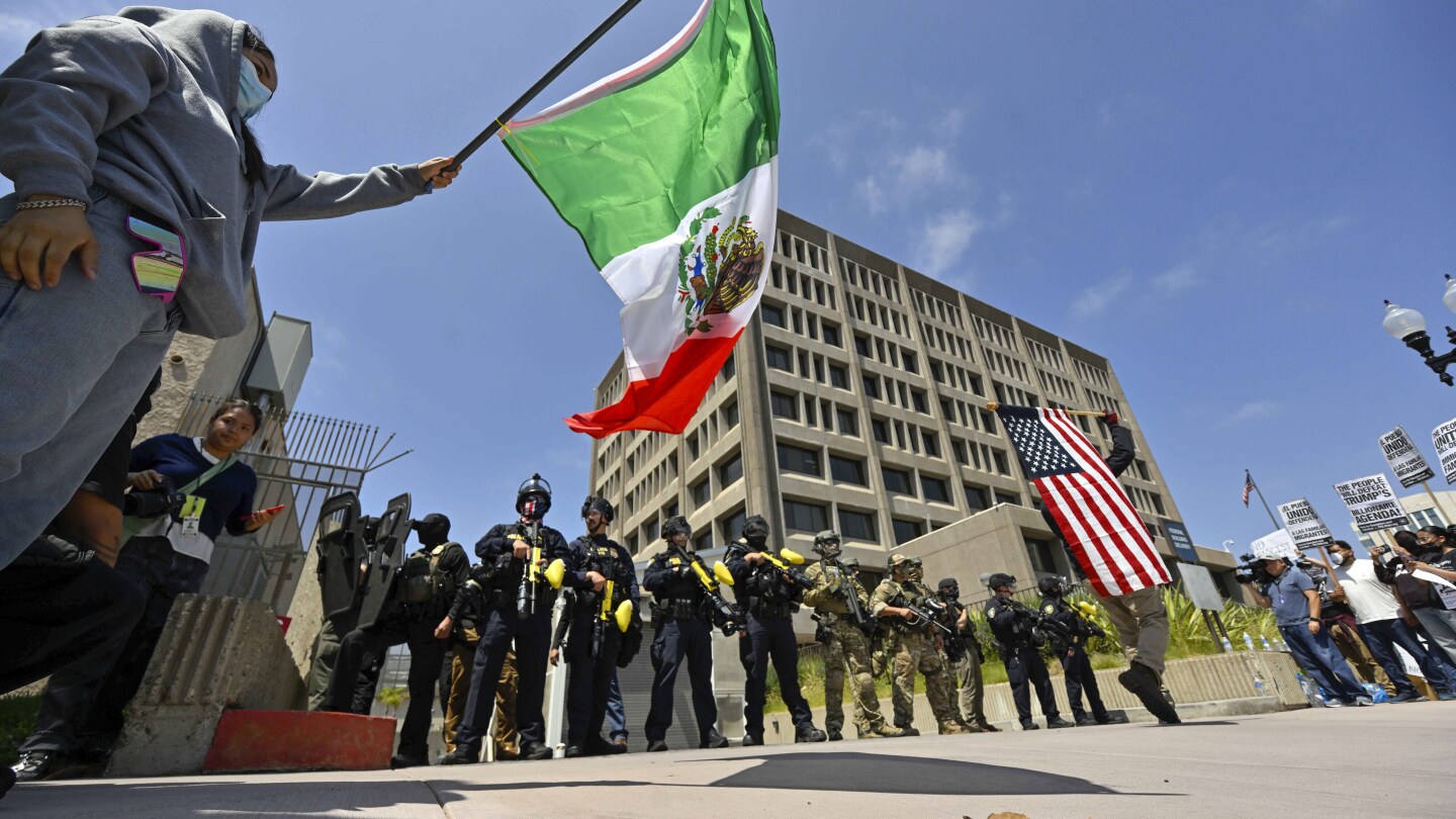 Protests over immigration raids pop up across the US