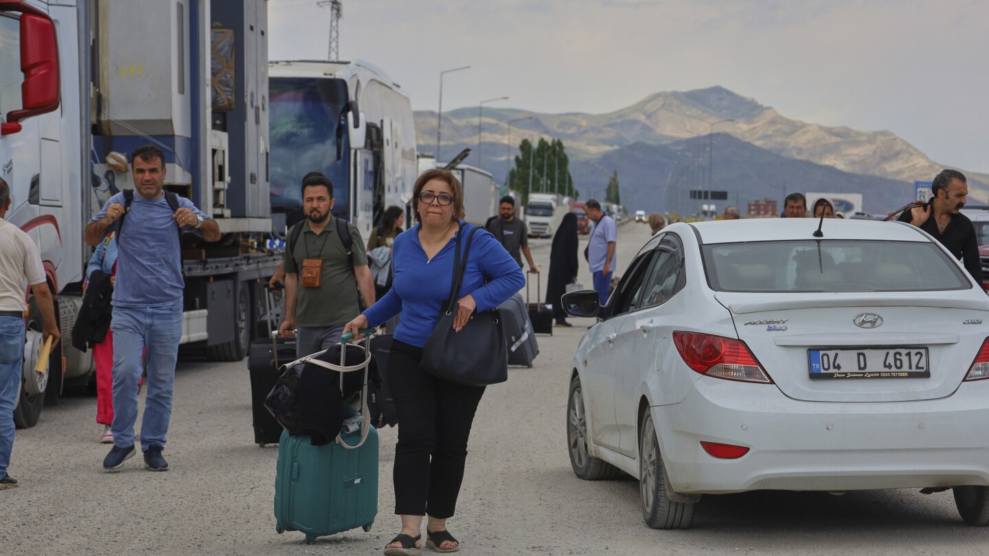 Iranians seek temporary refuge in neighboring Turkey as the conflict with Israel escalates