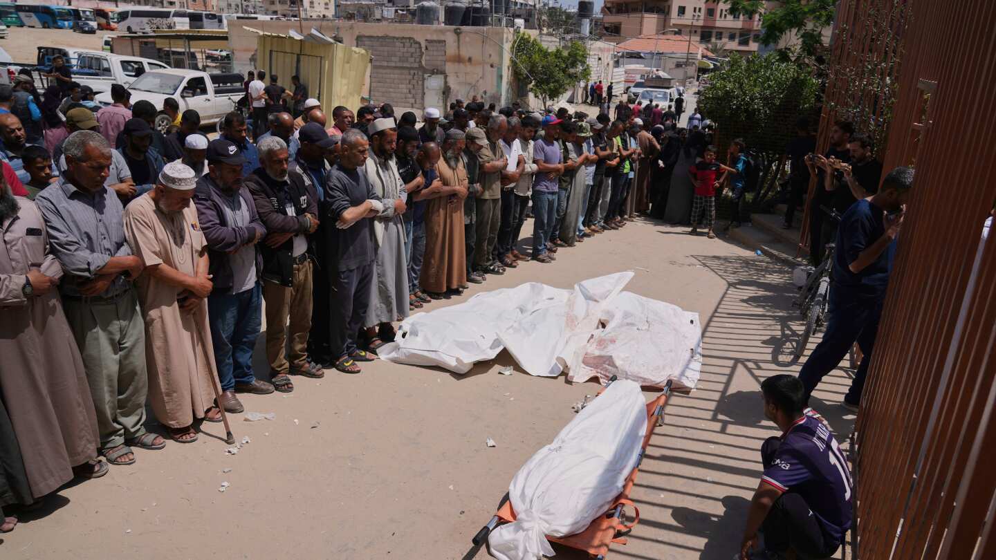 Israeli forces open fire a kilometer away from Gaza aid site, killing 3, health officials say