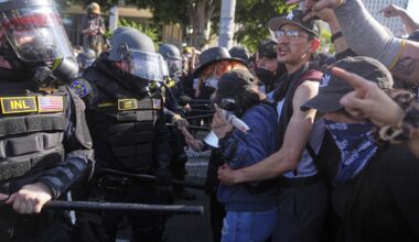 Trump warns protesters who spit on police but pardoned violent rioters