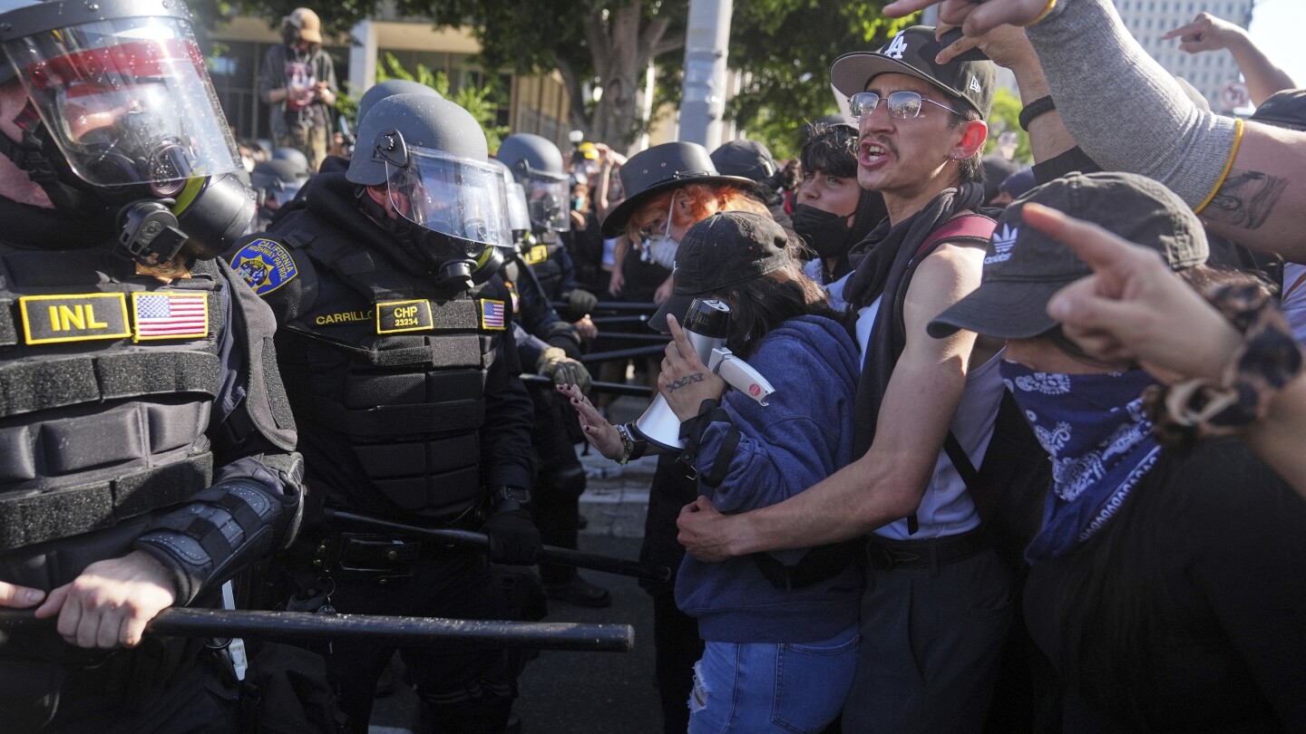 Trump warns protesters who spit on police but pardoned violent rioters