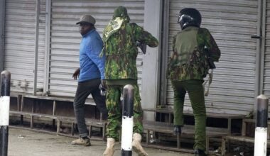Photos show Kenyan police officer shooting a civilian at close range