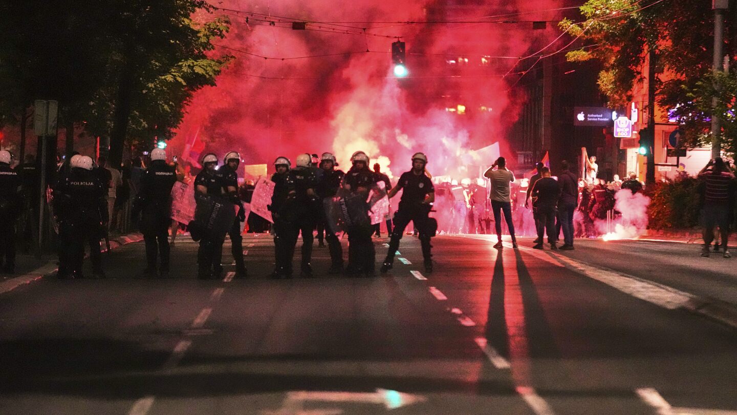 Dozens of protesters detained during clashes with riot police in Serbia