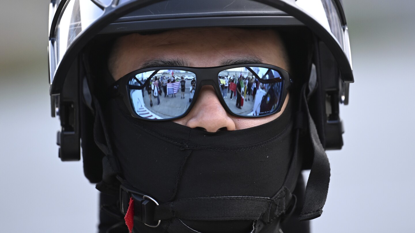 Officers who cover their faces could be charged with a misdemeanor under California proposal