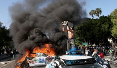 Waymo vehicles set on fire in downtown L.A. as protesters, police clash