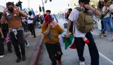 L.A. police use tear gas, flash-bangs on "No Kings" protesters in downtown