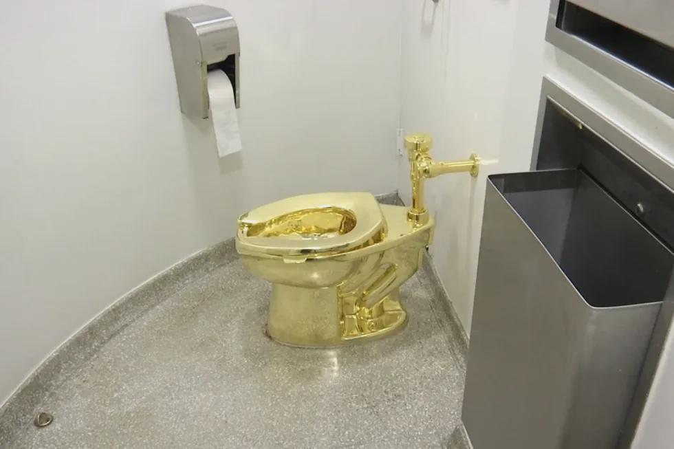Men who stole $6 million golden toilet from English mansion sentenced to prison terms