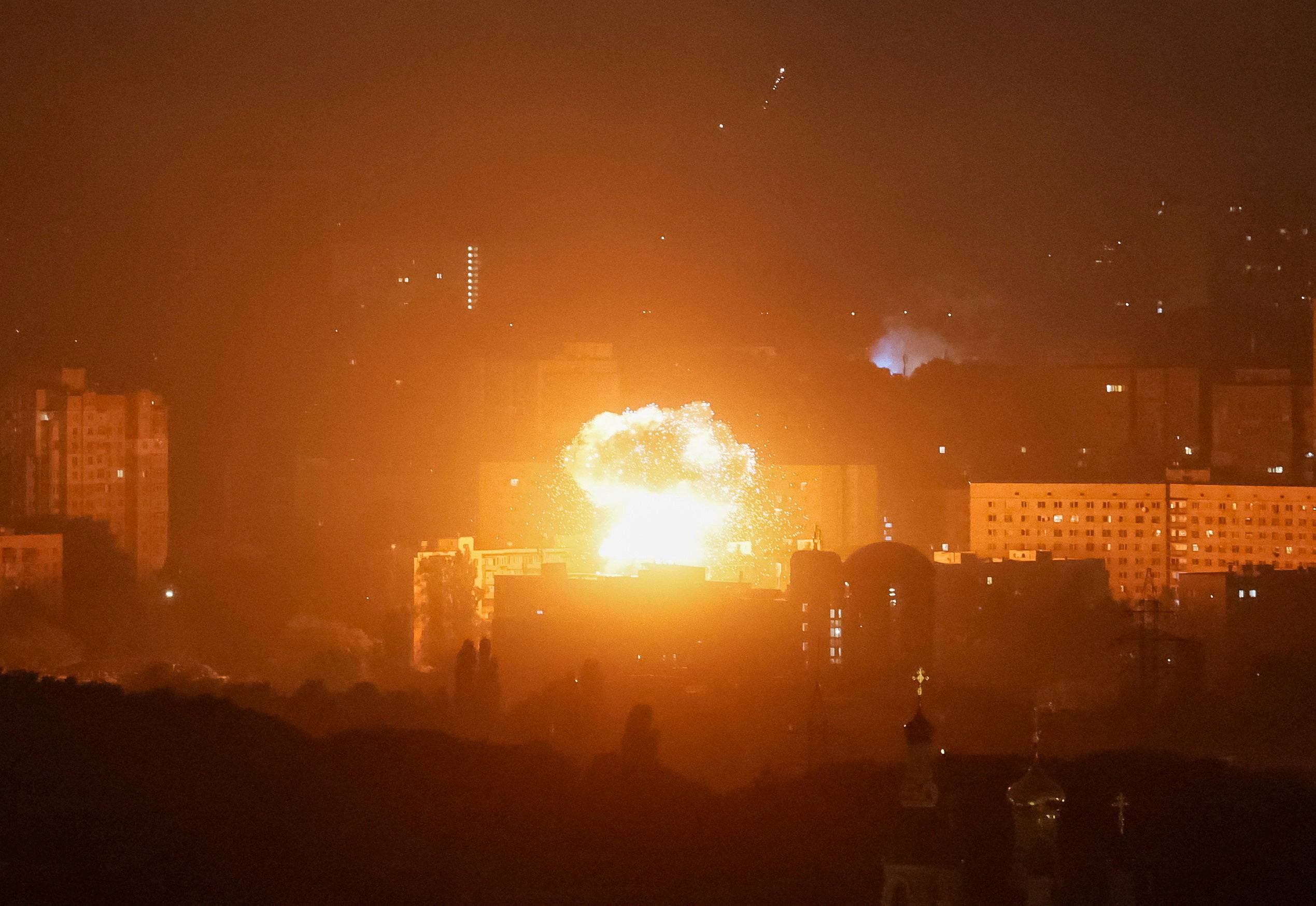 Drone explosion over Kyiv during a Russian drone strike.