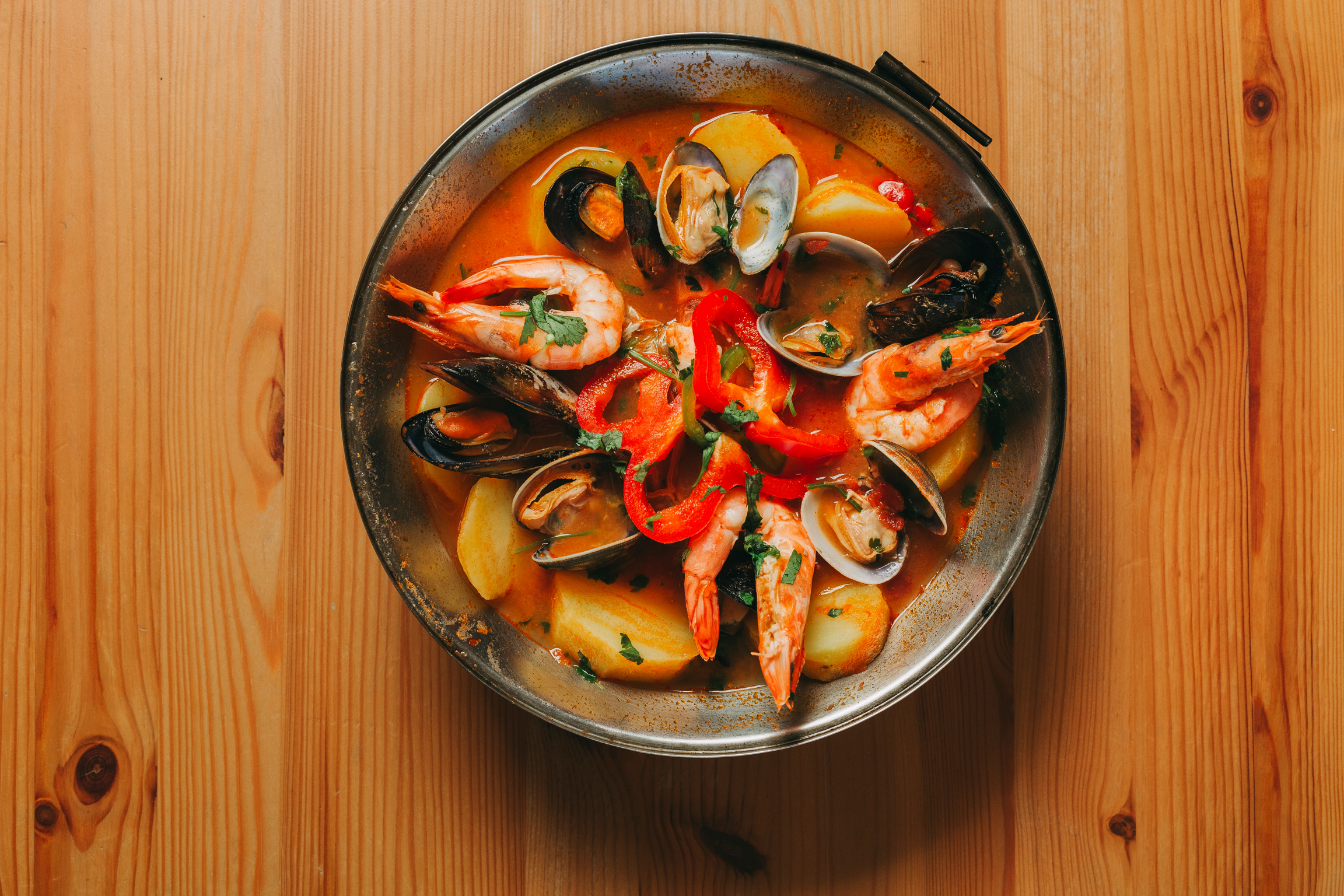Seafood stew in a pan.