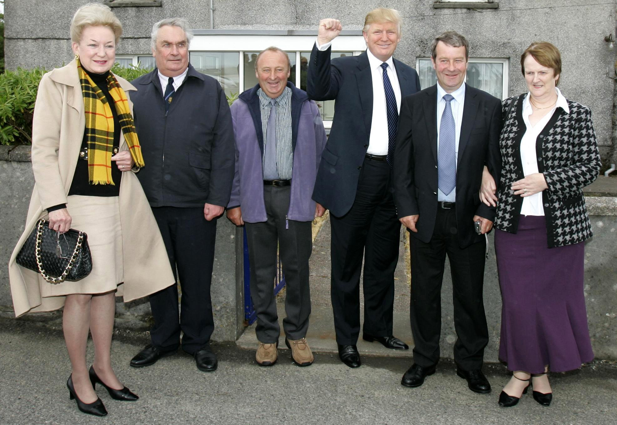 Donald Trump with family and associates at his mother's former home in Scotland.