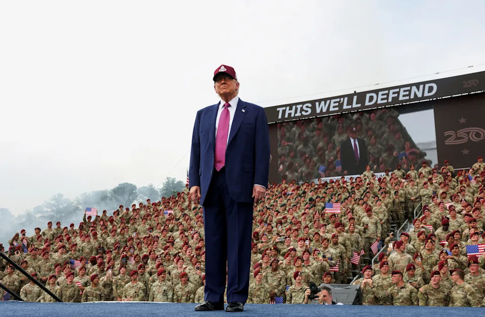 U.S. President Donald Trump stands onstage to deliver remarks during a visit to Fort Bragg to mark the U.S. Army anniversary, in North Carolina, U.S., June 10, 2025.